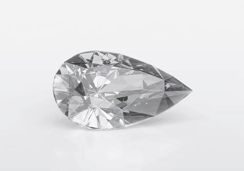 Diamond with reflection on white background
