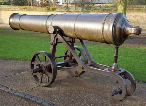The canon on Palace Green in Ely in Cambridgeshire in southeast England. The canon was originally captured from the Russians in Sebastopol. It was given to Ely by Queen Victoria in 1860 and has stood on Palace Green ever since.