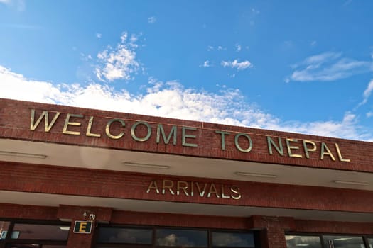 After landing at the Airport of Kathmandu, the sign over the arrival hall says: Welcome to Kathmandu, Nepal 2022