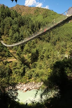 The long metal suspension bridge leading form Phakding to Sano Gemela, Gumela, Mount Everest Basecamp Trek, EBC, Nepal 2022