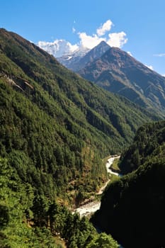 View onto the Dudh Khosi River and Mount Kusum Kanguru from the Hillary suspension bridge between Phakding and Namche Bazar, Bazaar, Mount Everest Basecamp Trek, Nepal 2022