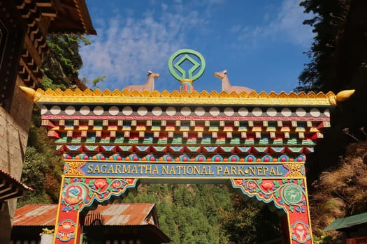 The colorful entrance gate of the Sagarmatha National Park in Monjo, Manjo village, Mount Everest Basecamp Trek, EBC, Nepal 2022