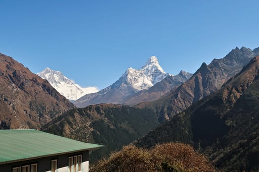 View onto the village of Tengboche, Tangboche in front of the snow covered peaks of Lhotse and Ama Dablam, Mount Everest Basecamp Trek, EBC, Nepal 2022