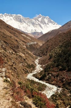 View onto the Imja Khola River, Shomare village in front of Mount Nuptse, Everest and Lhotse can be seen in the background, Mount Everest Base Camp Trek, EBC, Nepal 2022