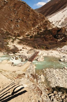 Small wooden bridge over the Lobuche River between Pangboche and Dingboche, Mount Everest Base Camp Trek, EBC, Nepal 2022