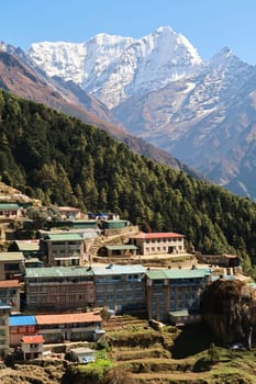 View onto a neighborhood of Namche Bazaar, Bazar with Mount Kusum Kanguru, Kangguru rising in the background, Mount Everest Base Camp Trek, EBC, Nepal 2022