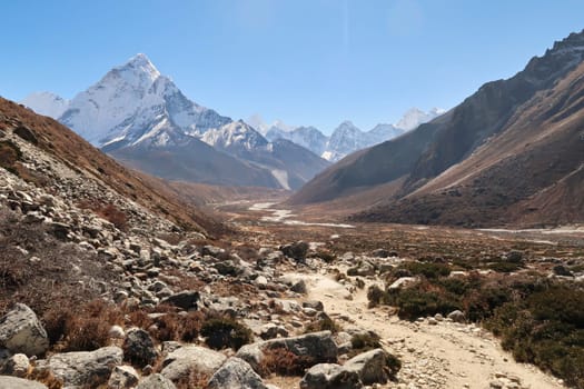 View into the Pheriche valley, Pheriche village can be seen in the distance in front of Mount Amphu Gyabjen, Ama Dablam, Kangtega and Thamserku, Mount Everest Base Camp Trek, EBC, Nepal 2022