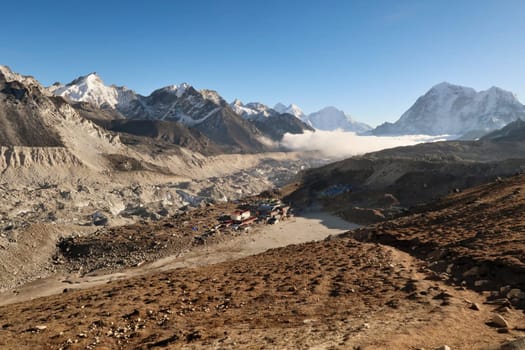 View from the way up to Kala Patthar, Pather onto Gorakshep, Gorak Shep village next to the Khumbu Glacier, Mount Lobuche, Thamserku, Kangtega, Pokalde, Kongma Tse, Mount Everest Base Camp Trek, Nepal 2022