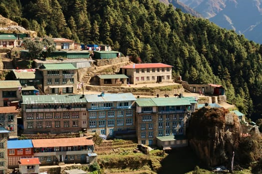 View onto teahouses, gues houses, buildings in a colorful neighborhood of Namche Bazaar, Bazar Mount Everest Base Camp Trek, EBC, Nepal 2022