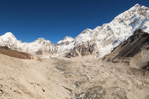 View onto the Khumbu Glacier from the trail next to it, with Mount Nuptse, the West Ridge of Everest, Changtse, Khumbutse and Lingtren in the background, Mount Everest Base Camp Trek, EBC, Nepal 2022