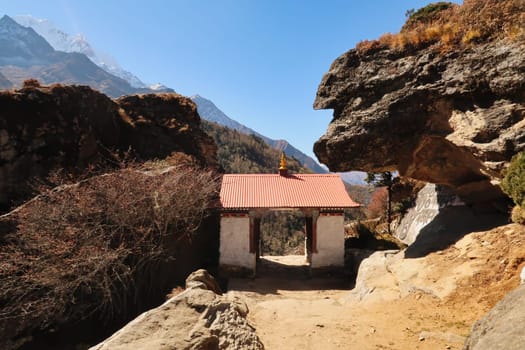 Tibetan buddhist gate on the trail on the way out of Pangboche village towards Tengboche, Tangboche village, Mount Everest Base Camp Trek, EBC, Nepal 2022