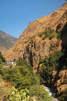 View from a distance onto Chamje, Chamche village right next to the gorge of the Marsyangdi River, Annapurna Circuit Trek, Nepal 2022