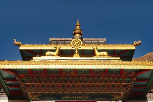 The colorful roof over the entrance to the tibetan buddhist temple of Upper Pisang, Annapurna Circuit Trek, Nepal 2022