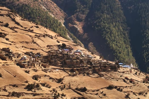 View from the trail to Manang back to the traditional mountain village of Ghyaru, Annapurna Circuit Trek, Nepal 2022