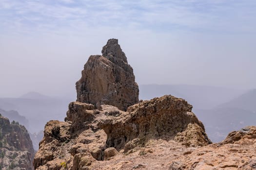 View of rock Morro de la Agujereada (1,956 m), the highest peak of island Gran Canaria, Spain, located in the mountains near Pico de las Nieves