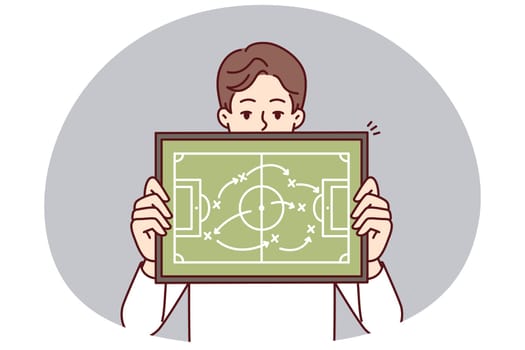 Man referee demonstrates plan for placement of football players teaching athletes tactics of conducting game in soccer. Guy football manager gives recommendation on tactics and strategy of match