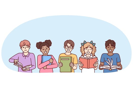 Little diverse kids with books smile and look at screen for happy childhood concept. Children boys and girls, elementary school students read textbooks given by teacher for extracurricular education