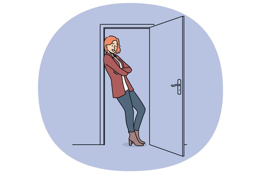 Cheerful woman stands in doorway with arms crossed and saying goodbye to guests. Girl is in doorway and looks at screen with smile, for concept of hospitality and friendship between neighbors