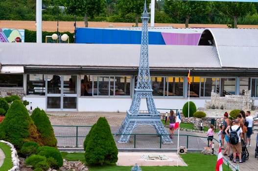 Viserba, Italy - June 25, 2024: People going at Theme park Italy in Miniature or Italia in Miniatura in Rimini, Italy - Reproduction of famous attractions in a small scale