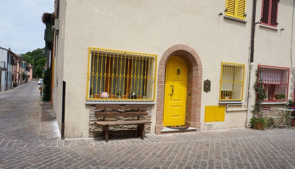 Rimini, Italy - June 25, 2024: The wall at Borgo San Giuliano typical street with low and colorful houses at Rimini, Italy