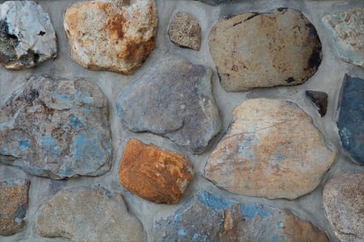 This field stone wall offers a rich, textured background with natural patterns and earthy tones. The rugged, weathered stones and handmade construction give a rustic and historic feel, making it perfect for use in designs that require a touch of authenticity. The durable and solid construction of the wall serves as a solid defense and foundation, standing the test of time and the elements.