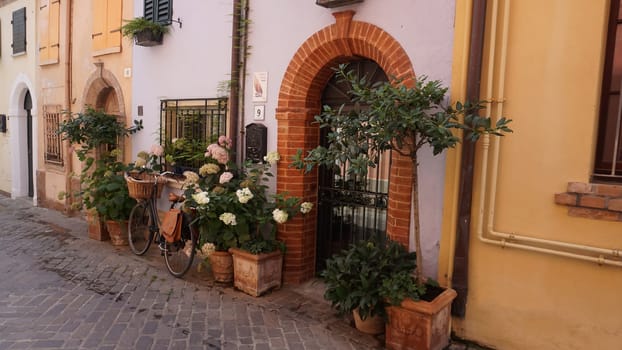 Rimini, Italy - June 25, 2024: The wall at Borgo San Giuliano typical street with low and colorful houses at Rimini, Italy