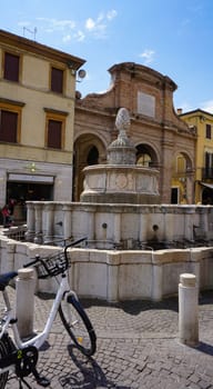 Rimini, Italy - June 25, 2024: Fountain of pine cone or Fontana Della Pigna at Piazza Cavour in Rimini at Italy