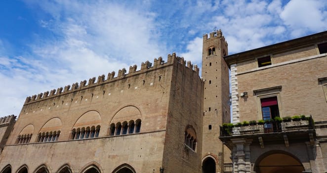 Rimini, Italy - June 25, 2024: Majestic Palazzo dell'Arengo in Piazza Cavour. Built in the XIII century in Romanesque-Gothic style at the behest of the mayor of Rimini it housed the Council of the Rimini
