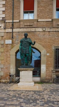 Rimini, Italy - June 25, 2024: Monument to Gaius Julius Caesar in Rimini at Italy