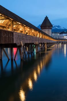 Chapel Bridge - a 14th century covered wooden footbridge that spans the Reuss in the city of Luzern (Lucerne) in Switzerland.