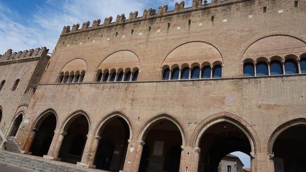 Rimini, Italy - June 25, 2024: Majestic Palazzo dell'Arengo in Piazza Cavour. Built in the XIII century in Romanesque-Gothic style at the behest of the mayor of Rimini it housed the Council of the Rimini