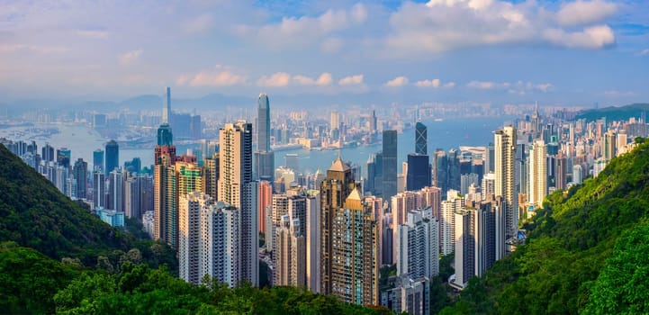 Famous view of Hong Kong - Hong Kong skyscrapers skyline cityscape panorama from Victoria Peak on sunset. Hong Kong, China