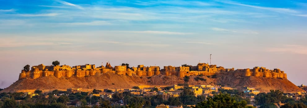 Panorama of Jaisalmer Fort - one of the largest forts in the world, known as the Golden Fort Sonar quila on sunrise. Jaisalmer, Rajasthan, India