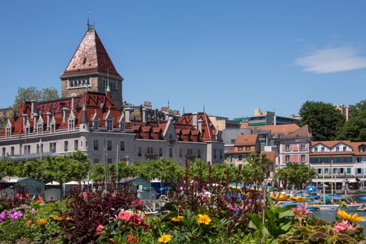 Chateau d'Ouchy and the waterfront in the town of Ouchy on the north shore of Lake Geneve in Switzerland.