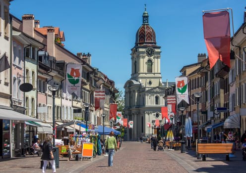 The busy main street in the town of Morges on the north shore of Lake Geneva in the Vaud canton of Switzerland.