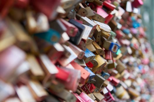 Love padlocks as a sign of eternal commitment on the Hohenzollern Bridge in Cologne in Germany