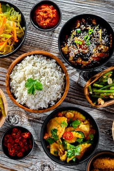Composition with variety of east asian dishes.