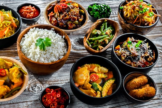Composition with variety of east asian dishes.