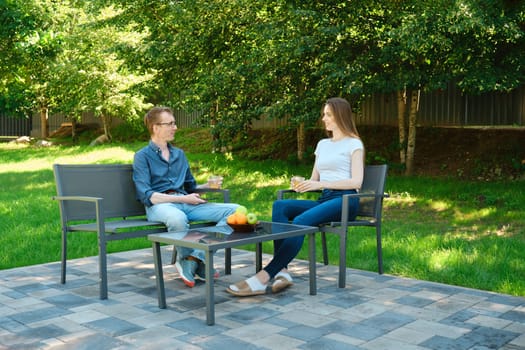 The daughter came to a country house of her father and talks about her life and successes in the city
