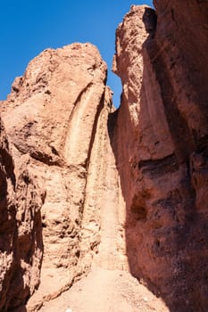 A chute rock formation in Natural Bridge Canyon in Death Vallley National Park in California