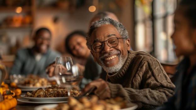 A multi-generational family gathers in the living room, shares stories, and laughs before a Thanksgiving meal.
