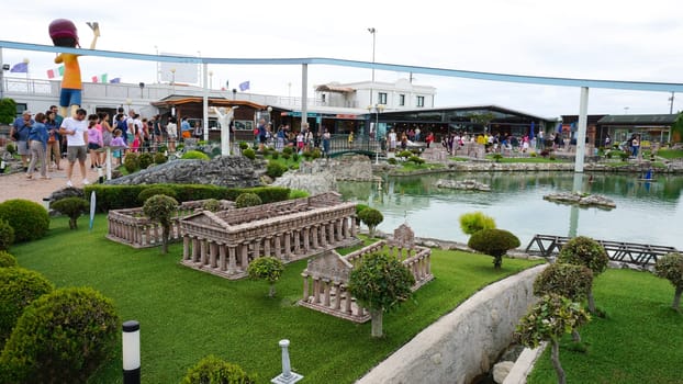 Viserba, Italy - June 25, 2024: People going at Theme park Italy in Miniature or Italia in Miniatura in Rimini, Italy - Reproduction of famous attractions in a small scale