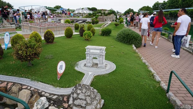 Viserba, Italy - June 25, 2024: People going at Theme park Italy in Miniature or Italia in Miniatura in Rimini, Italy - Reproduction of famous attractions in a small scale