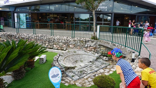 Viserba, Italy - June 25, 2024: People going at Theme park Italy in Miniature or Italia in Miniatura in Rimini, Italy - Reproduction of famous attractions in a small scale