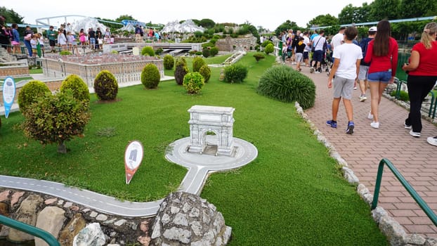 Viserba, Italy - June 25, 2024: People going at Theme park Italy in Miniature or Italia in Miniatura in Rimini, Italy - Reproduction of famous attractions in a small scale