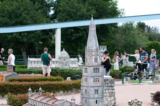 Viserba, Italy - June 25, 2024: People going at Theme park Italy in Miniature or Italia in Miniatura in Rimini, Italy - Reproduction of famous attractions in a small scale