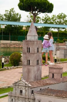 Viserba, Italy - June 25, 2024: People going at Theme park Italy in Miniature or Italia in Miniatura in Rimini, Italy - Reproduction of famous attractions in a small scale