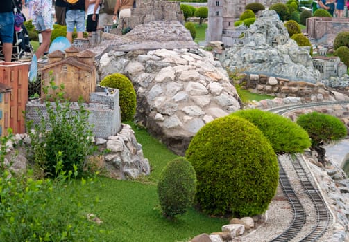 Viserba, Italy - June 25, 2024: People going at Theme park Italy in Miniature or Italia in Miniatura in Rimini, Italy - Reproduction of famous attractions in a small scale