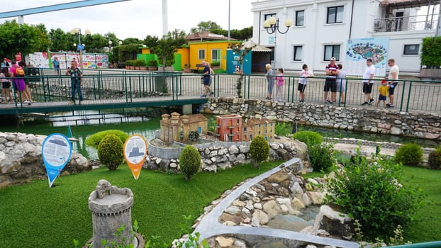 Viserba, Italy - June 25, 2024: People going at Theme park Italy in Miniature or Italia in Miniatura in Rimini, Italy - Reproduction of famous attractions in a small scale