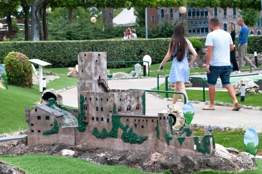 Viserba, Italy - June 25, 2024: People going at Theme park Italy in Miniature or Italia in Miniatura in Rimini, Italy - Reproduction of famous attractions in a small scale